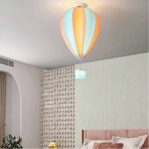 Colourful hot air balloon shaped chandelier in pastel blue and orange