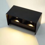 Black rectangular LED wall light photographed from above with two downward light cones