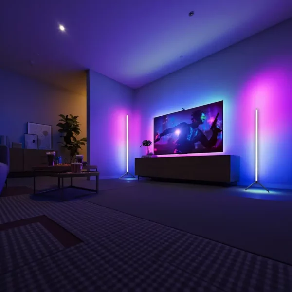 Pair of tall LED corner floor lamps glowing in shifting colours beside a TV