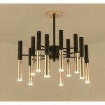 Multi-arm black and gold chandelier with tube-shaped bulbs