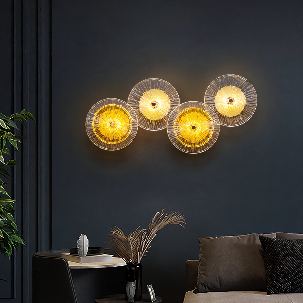 applique-murale-boheme-led-disques-en-verre-2.jpeg Wall light with four overlapping glass discs glowing yellow