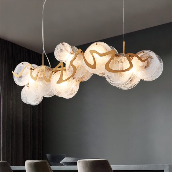Cluster chandelier with clear glass bubble globes on gold branches
