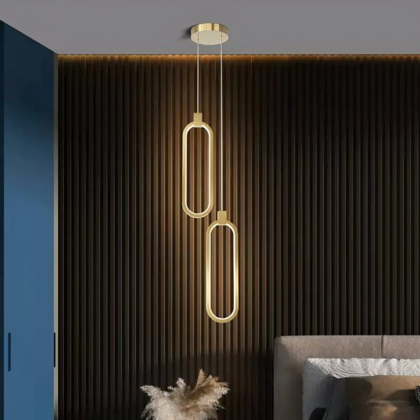 Gold LED pendant light with two stacked oval rings