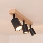 Wood bar and black metal ceiling light with adjustable spots
