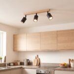 Wood bar and black metal ceiling light with adjustable spots
