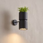 Black wall light with planter and spotlight